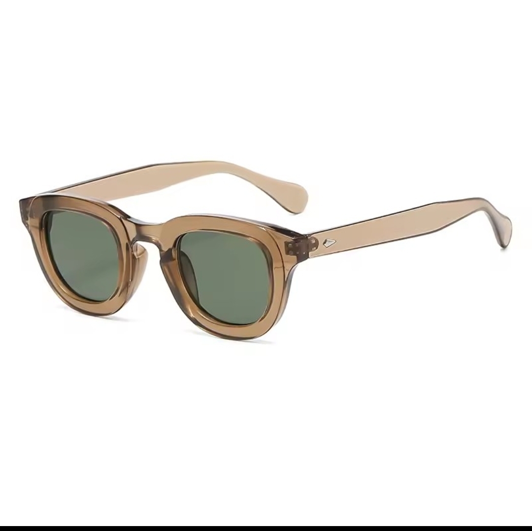 Translucent tan with green lenses