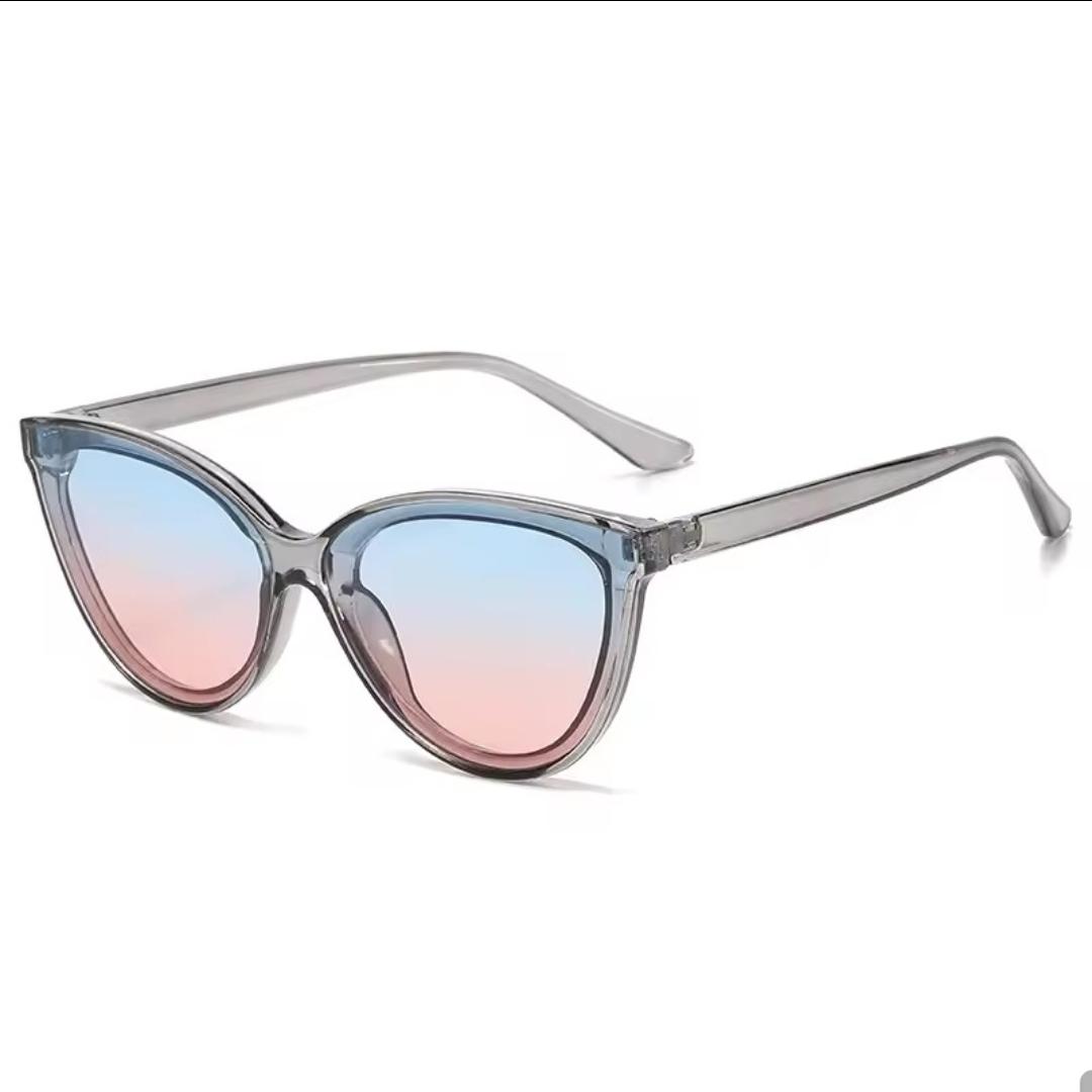 Translucent grey cat-eye with blue and pink gradient lens